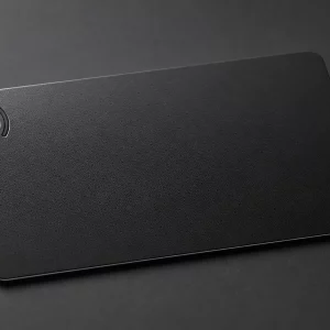 Publication-safe matte black NFC card with no personal, company or QR data